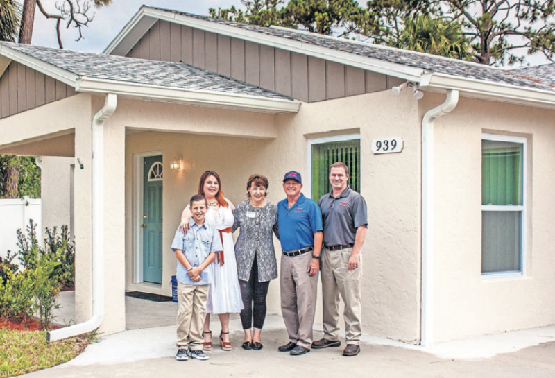 (l-r) Homeowners Andrew and Danielle; Lori Gillooly, CEO of Habitat for Humanity of Greater Volusia County; Bill Thompson, Chairman of Thompson Pump; and Chris Thompson, President of Thompson Pump.