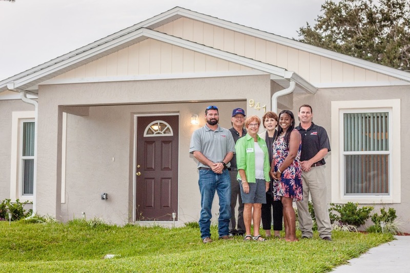 (l-r) Bobby Thompson, Regional Manager of Thompson Pump; Bill Thompson, Chairman of Thompson Pump; Patricia Ford, President of Habitat for Humanity of Greater Volusia County; Lori Gillooly, CEO of Habitat for Humanity of Greater Volusia County; Danyelle Adkins, homeowner; and Chris Thompson, President of Thompson Pump.